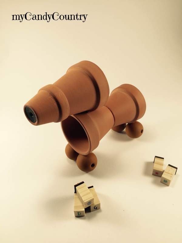 Riciclo creativo: come creare un bassotto con i vasi di terracotta bambini home decor legno e natura Riciclo Creativo 