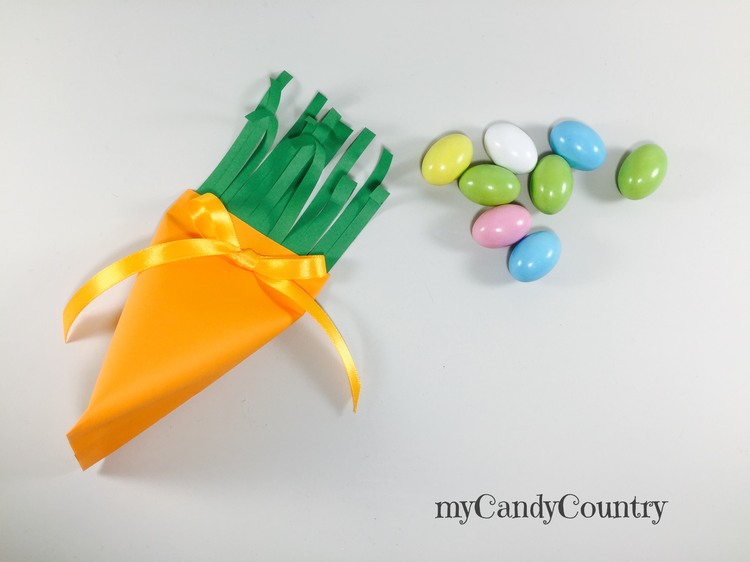 Portauovo di Pasqua fai da te a forma di carota carta e cartone Pasqua fai da te Riciclo Creativo 